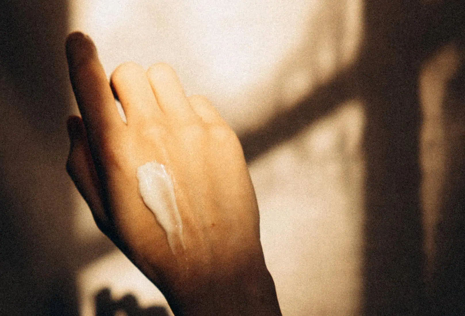 Cream on skin illustrating protection against trans epidermal water loss