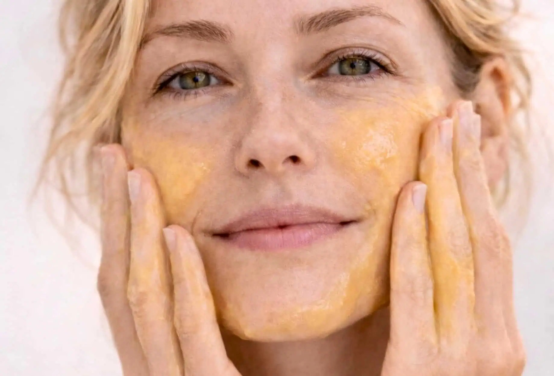 Woman gently cleansing face for sensitive and sensitised skin care