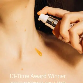 Applying organic body oil to skin for hydration and barrier support